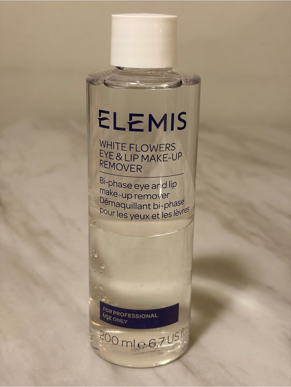 ELEMIS White Flowers Eye & Lip Make-Up Remover — Clear Bottle with White Cap